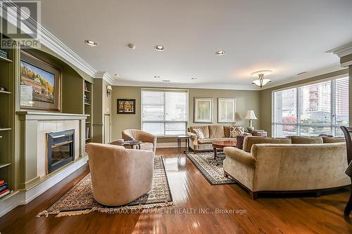 601 - 3000 Creekside Drive, Hamilton, ON - Indoor Photo Showing Living Room With Fireplace