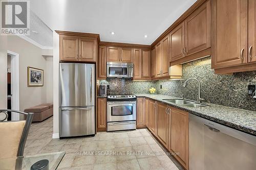 601 - 3000 Creekside Drive, Hamilton, ON - Indoor Photo Showing Kitchen With Stainless Steel Kitchen With Double Sink