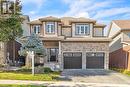 View of front facade with a garage - 48 Isaiah Drive, Kitchener, ON 