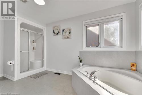 Bathroom with shower with separate bathtub - 48 Isaiah Drive, Kitchener, ON 