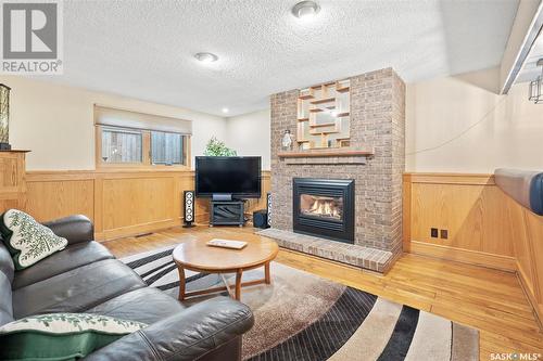 26 Kindrachuk Crescent, Saskatoon, SK - Indoor Photo Showing Living Room With Fireplace