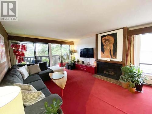 202 110 Seventh Street, New Westminster, BC - Indoor Photo Showing Living Room With Fireplace