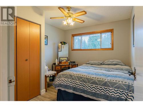 64 Moller Road, Fruitvale, BC - Indoor Photo Showing Bedroom