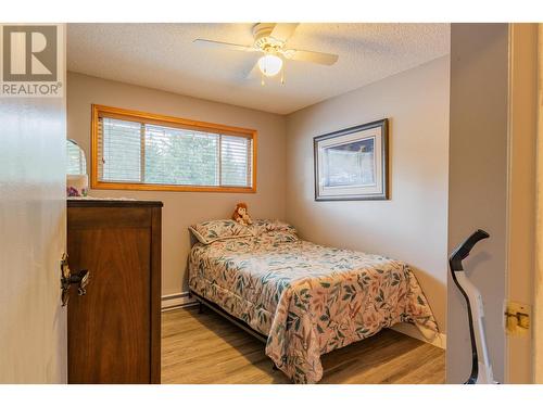 64 Moller Road, Fruitvale, BC - Indoor Photo Showing Bedroom