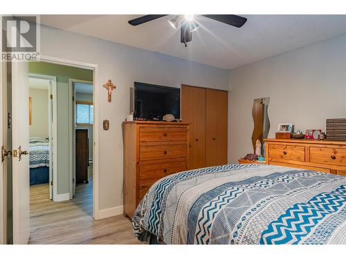 64 Moller Road, Fruitvale, BC - Indoor Photo Showing Bedroom