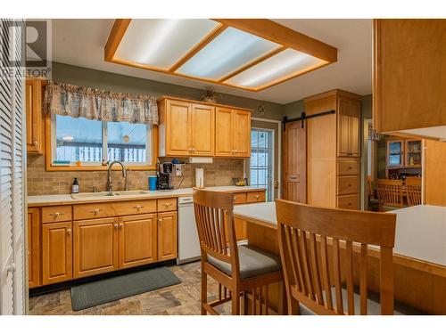 64 Moller Road, Fruitvale, BC - Indoor Photo Showing Kitchen With Double Sink