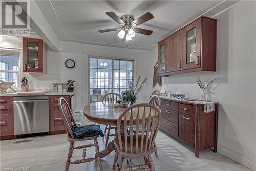 Dining space with a wealth of natural light and ceiling fan - 476 Prospect Street, Kitchener, ON 