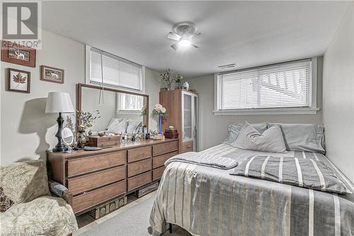 Bedroom with ceiling fan and carpet - 476 Prospect Street, Kitchener, ON 