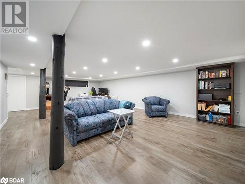 Living room with light hardwood / wood-style flooring - 206 Mary Street, Orillia, ON 