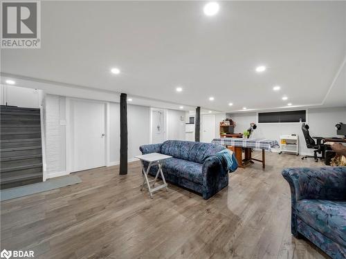 Living room featuring light wood-type flooring - 206 Mary Street, Orillia, ON 