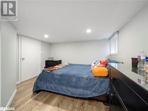 Bedroom featuring light hardwood / wood-style floors - 206 Mary Street, Orillia, ON 