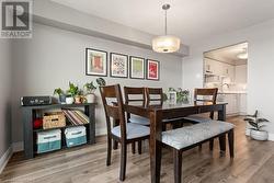 Dining area featuring light hardwood / wood-style flooring and sink - 