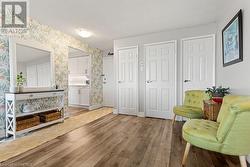 Bathroom featuring a textured ceiling and hardwood / wood-style flooring - 