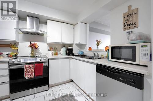 1811 - 410 Mclevin Avenue, Toronto, ON - Indoor Photo Showing Kitchen With Double Sink