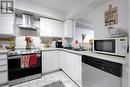 1811 - 410 Mclevin Avenue, Toronto, ON  - Indoor Photo Showing Kitchen With Double Sink 