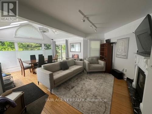 16 Woodward Avenue, London, ON - Indoor Photo Showing Living Room With Fireplace