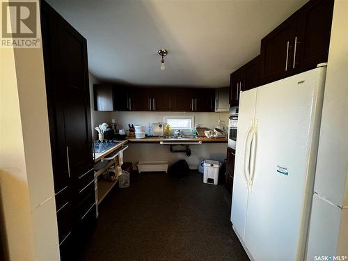 101 4Th Avenue W, Gravelbourg, SK - Indoor Photo Showing Kitchen With Double Sink