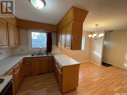 30 Irvin Crescent, Regina, SK - Indoor Photo Showing Kitchen With Double Sink