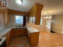 30 Irvin Crescent, Regina, SK  - Indoor Photo Showing Kitchen With Double Sink 