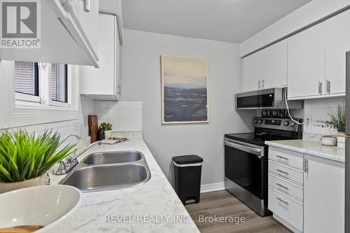 1409 Ritson Road S, Oshawa, ON - Indoor Photo Showing Kitchen With Double Sink