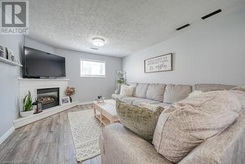 18 Windemere Avenue, Tillsonburg, ON - Indoor Photo Showing Living Room With Fireplace