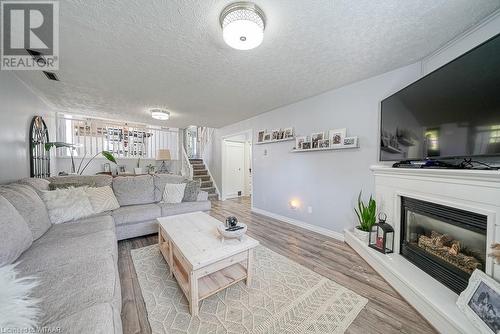 18 Windemere Avenue, Tillsonburg, ON - Indoor Photo Showing Living Room With Fireplace