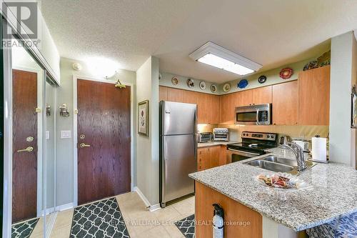 102 - 55 Via Rosedale Way, Brampton, ON - Indoor Photo Showing Kitchen With Double Sink