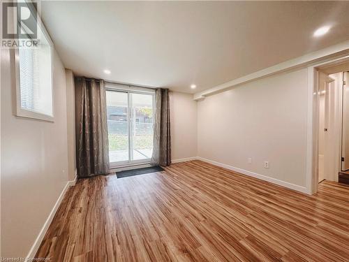 Spare room with light wood-type flooring - 20 Pintail Place, Cambridge, ON 