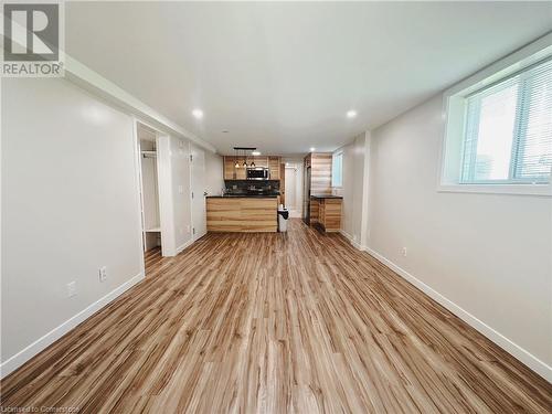 Unfurnished living room featuring light wood-type flooring - 20 Pintail Place, Cambridge, ON 