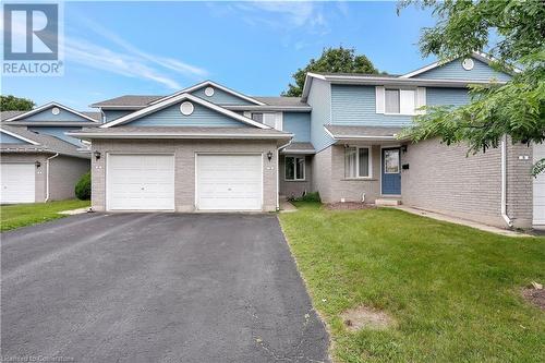 405 Kingscourt Drive Unit# 4, Waterloo, ON - Outdoor With Facade