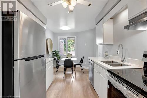 405 Kingscourt Drive Unit# 4, Waterloo, ON - Indoor Photo Showing Kitchen With Stainless Steel Kitchen With Double Sink With Upgraded Kitchen