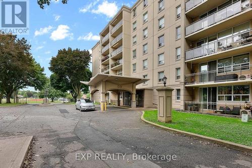 309 - 6390 Huggins Street, Niagara Falls, ON - Outdoor With Balcony With Facade