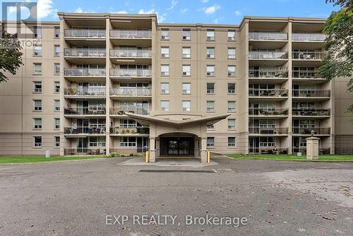 309 - 6390 Huggins Street, Niagara Falls, ON - Outdoor With Balcony With Facade