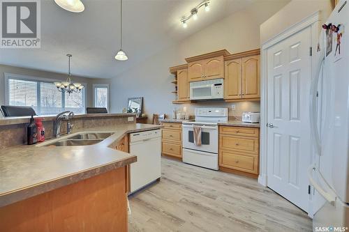 49 Qu'Appelle Crescent, Balgonie, SK - Indoor Photo Showing Kitchen With Double Sink