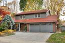 Front facade featuring a garage - 147 Dalewood Drive, Kitchener, ON 