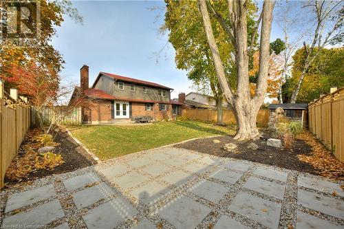 Back of house featuring a patio and a lawn - 147 Dalewood Drive, Kitchener, ON 