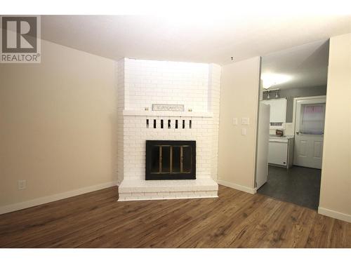 13707 Dickson Avenue Unit# 5, Summerland, BC - Indoor Photo Showing Living Room With Fireplace