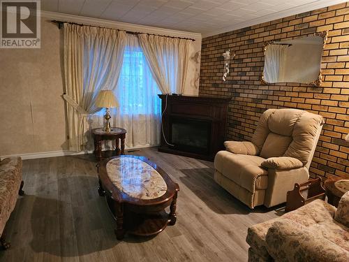 37 Legallais Street, Channel-Port Aux Basques, NL - Indoor Photo Showing Other Room With Fireplace