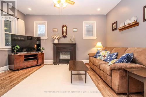 257 Carlisle Avenue, Peterborough (Ashburnham), ON - Indoor Photo Showing Living Room With Fireplace