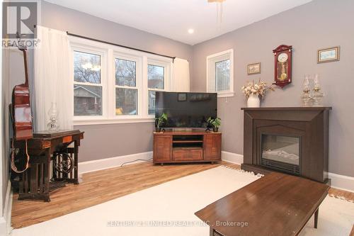 257 Carlisle Avenue, Peterborough (Ashburnham), ON - Indoor Photo Showing Living Room With Fireplace