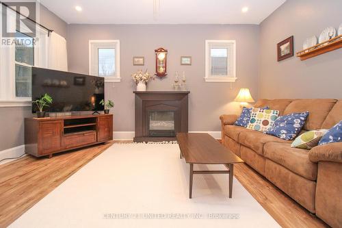 257 Carlisle Avenue, Peterborough (Ashburnham), ON - Indoor Photo Showing Living Room With Fireplace