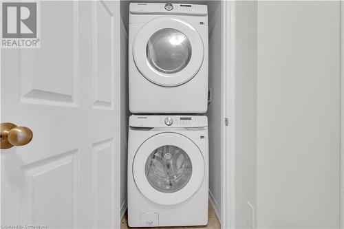 Washroom with stacked washer / dryer - 677 Park Road N Unit# 147, Brantford, ON 