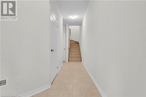 Hallway with light tile patterned floors - 677 Park Road N Unit# 147, Brantford, ON 