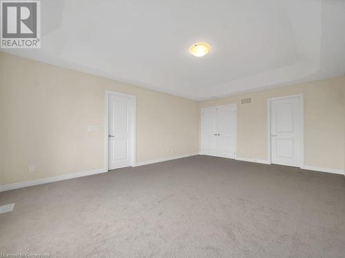 Unfurnished bedroom featuring carpet flooring - 126 Broadacre Drive, Kitchener, ON 