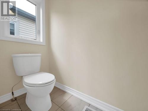 Bathroom featuring tile patterned flooring and toilet - 126 Broadacre Drive, Kitchener, ON 