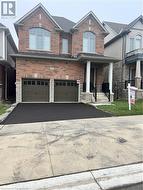 View of front of house with a garage - 