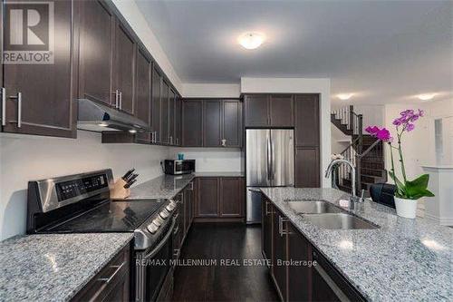 451 Whitlock Avenue, Milton, ON - Indoor Photo Showing Kitchen With Stainless Steel Kitchen With Double Sink With Upgraded Kitchen