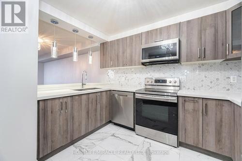 1403 - 236 Albion Road, Toronto, ON - Indoor Photo Showing Kitchen With Double Sink With Upgraded Kitchen