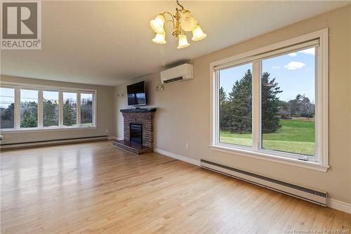 131 Rue Evangeline Street, Bouctouche, NB - Indoor Photo Showing Living Room With Fireplace