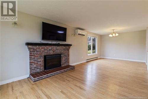 131 Rue Evangeline Street, Bouctouche, NB - Indoor Photo Showing Living Room With Fireplace